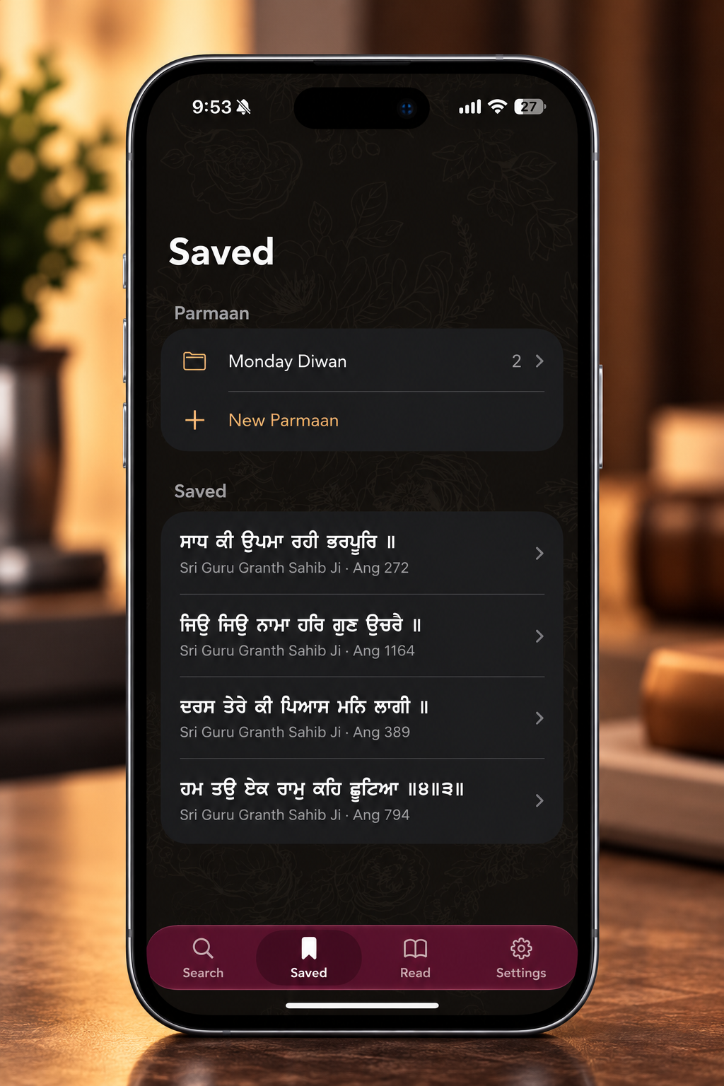Saved tab with a Monday Diwan Parmaan and bookmarked shabads on iPhone